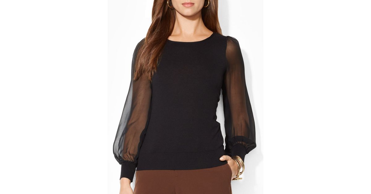 black sweater with sheer sleeves