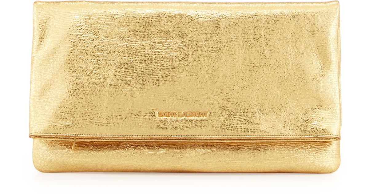large gold clutch bag