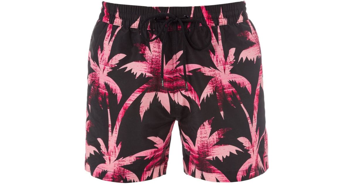 black and pink swim trunks