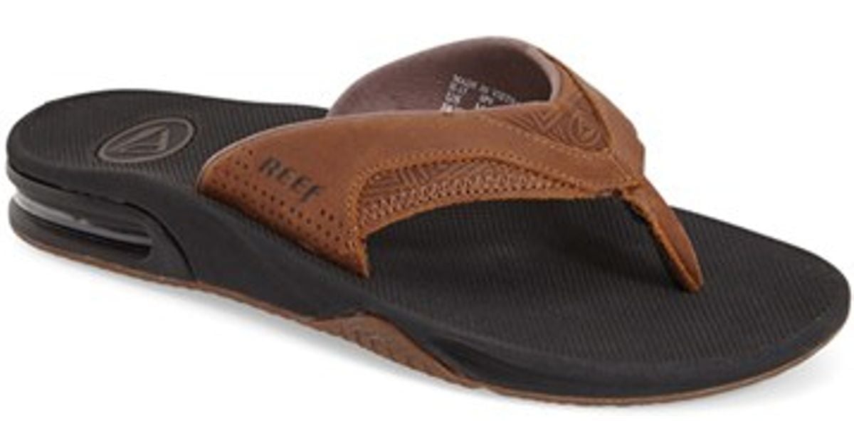 reef brown leather flip flops