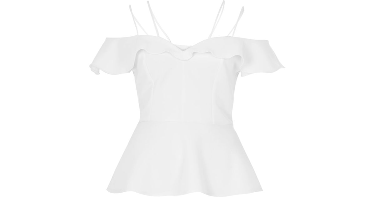 white frilly top
