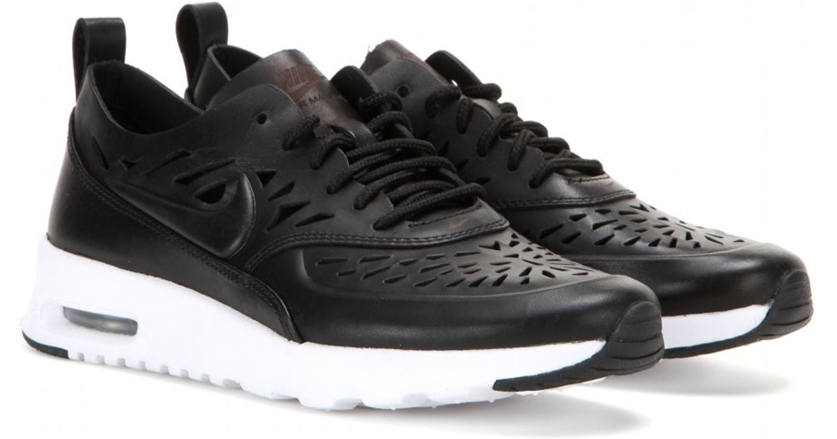 nike thea black leather