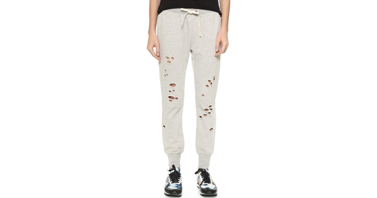 sweatpants with holes in knees