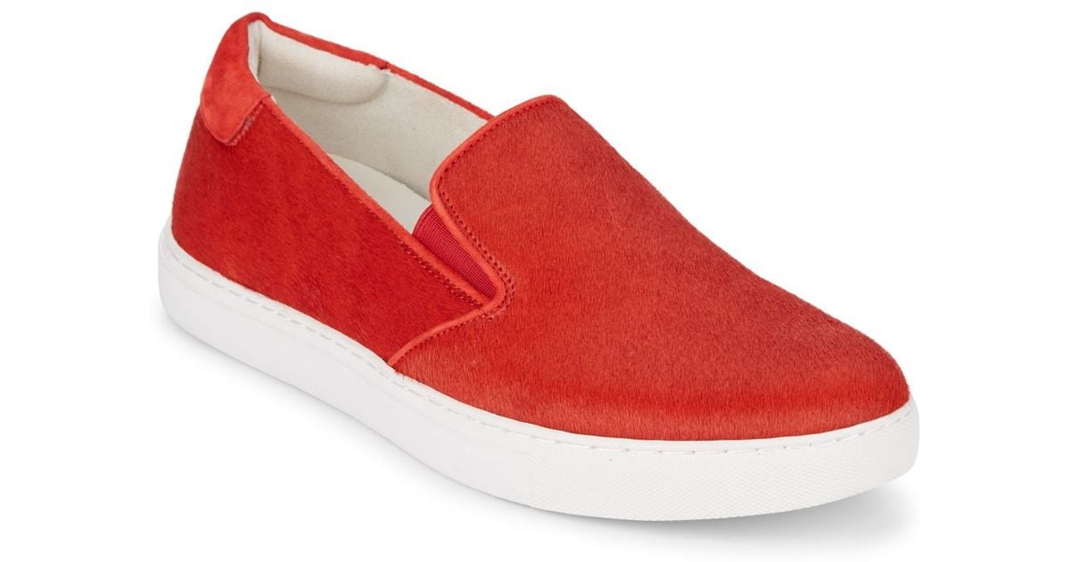 red slip on sneakers