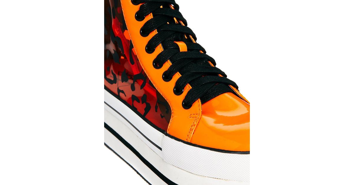 orange platform sneakers