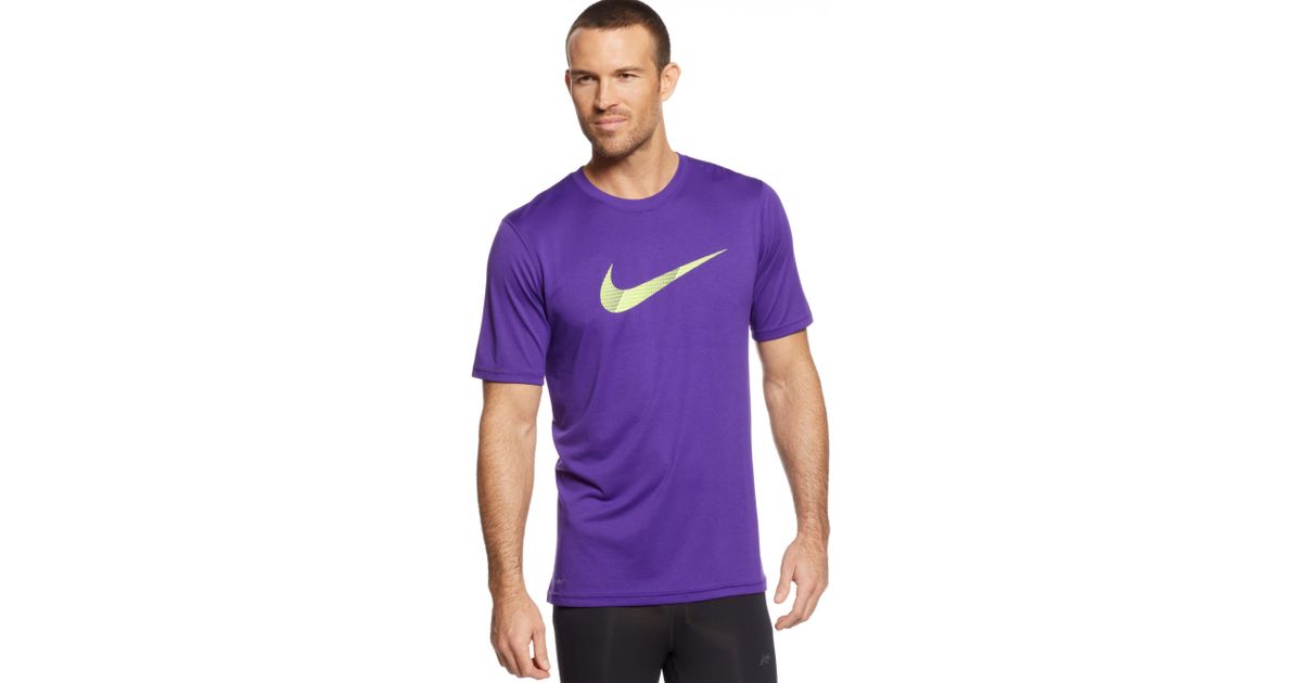 white nike shirt with purple swoosh