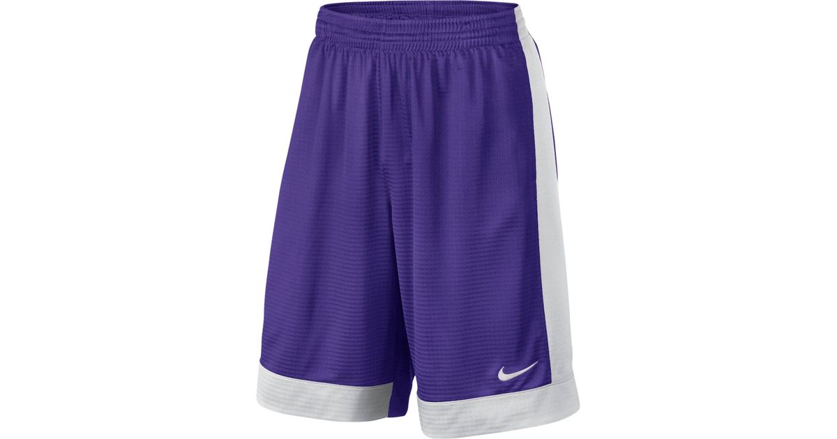 purple and white nike shorts