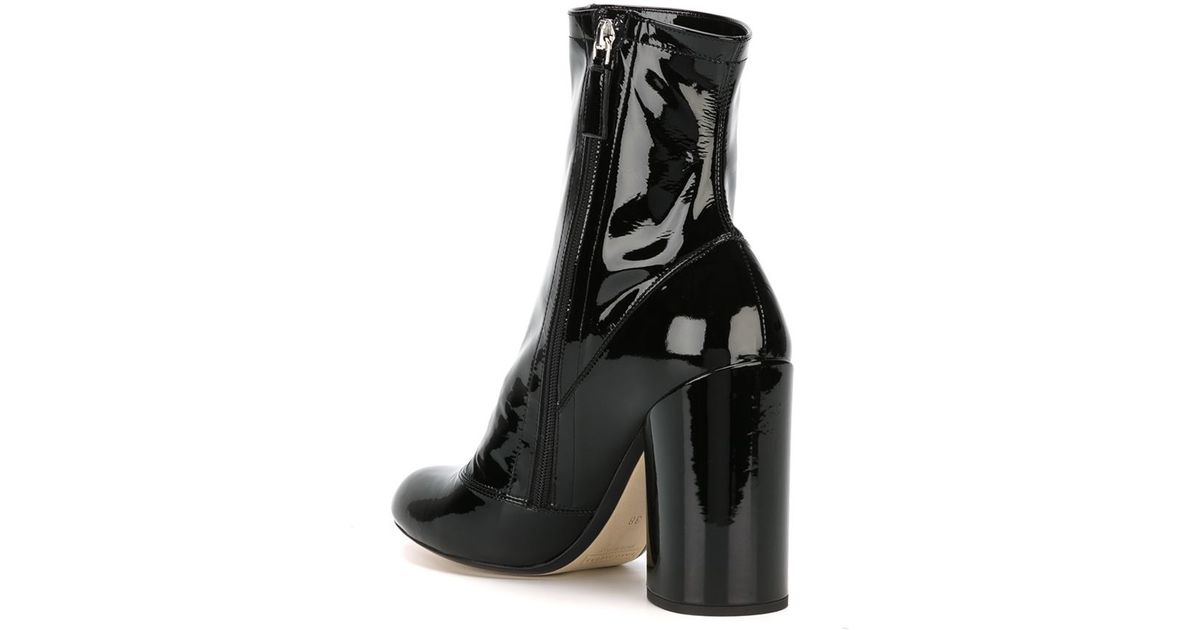glossy black ankle boots