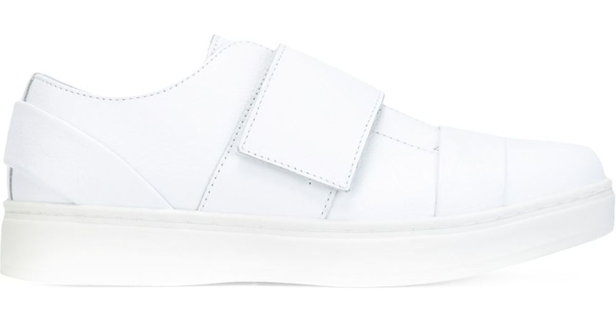 white velcro strap sneakers