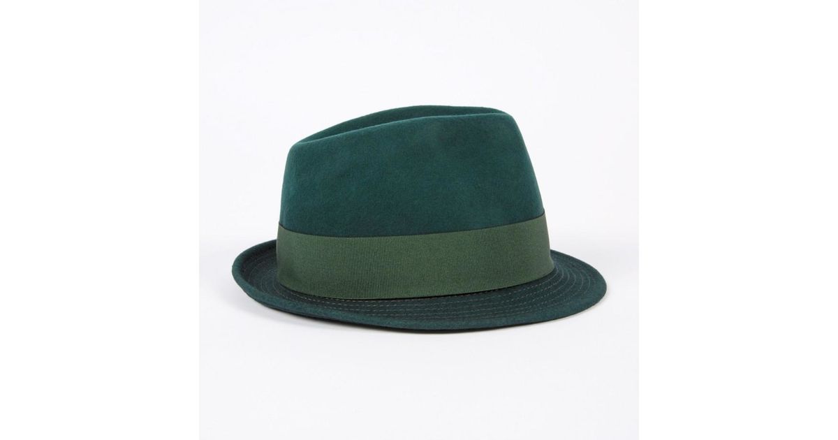 green trilby hat