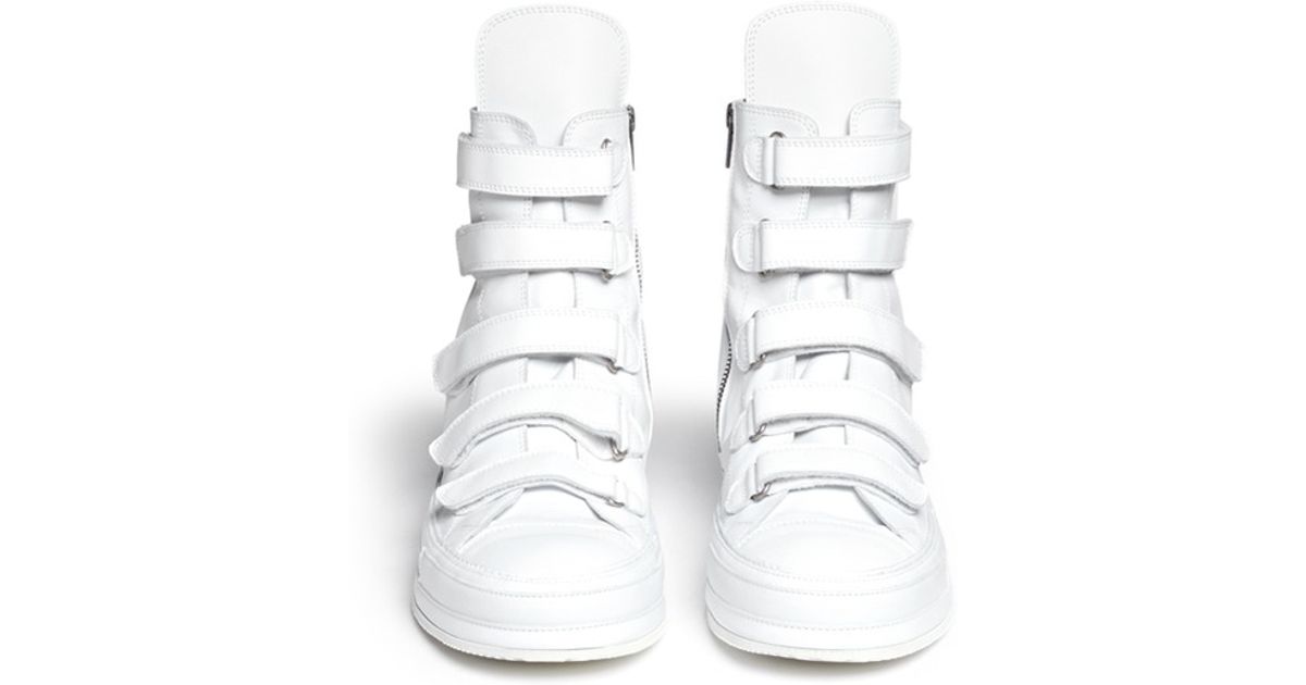 high top strap sneakers