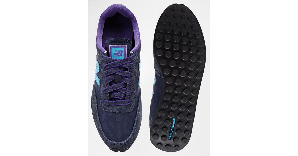 new balance 410 navy and white trainers