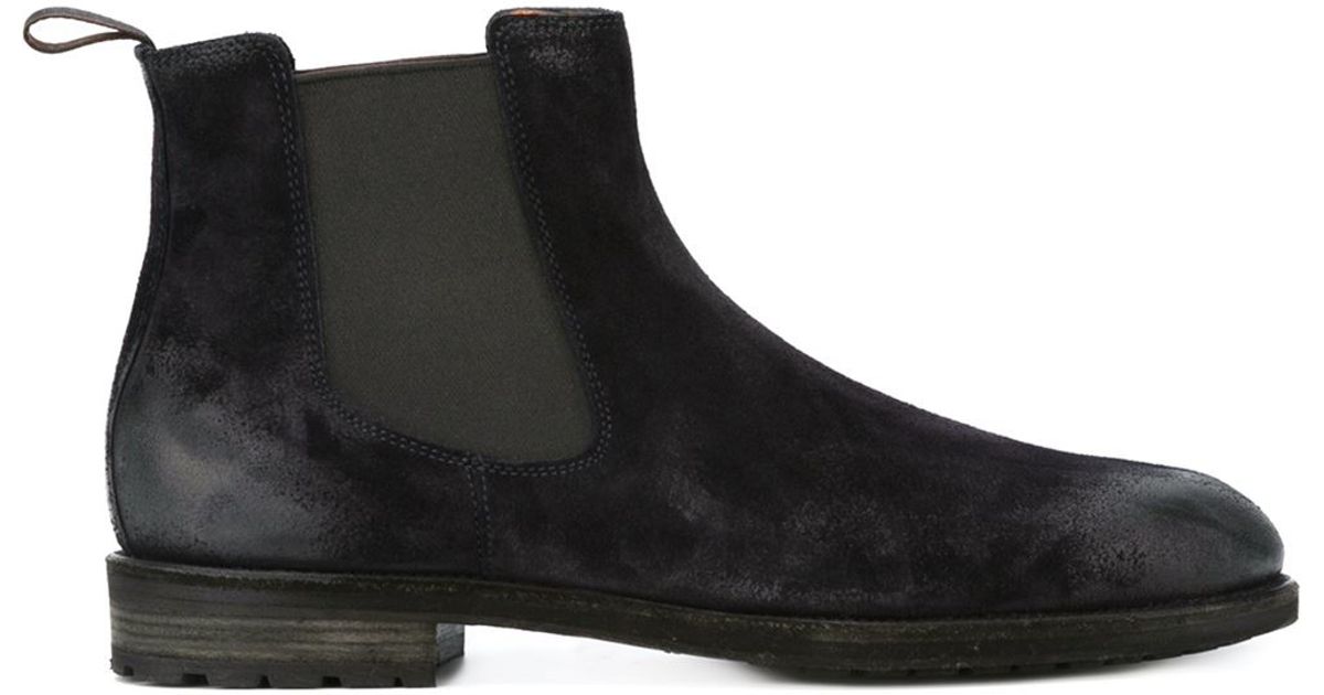 worn chelsea boots