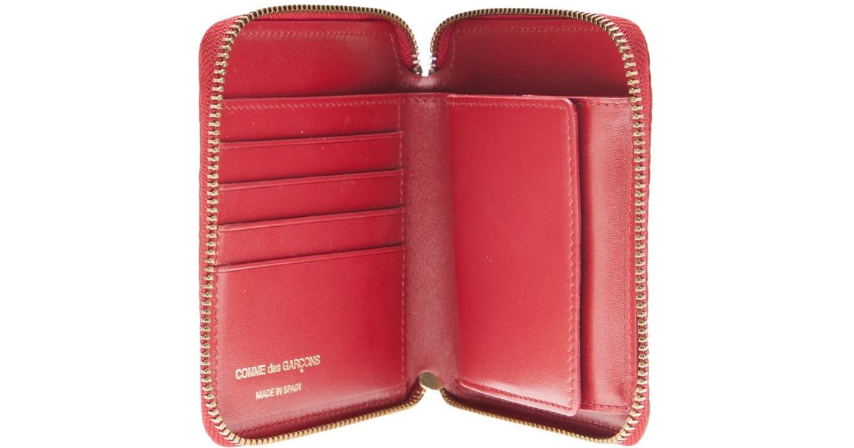 comme des garcons zip wallet iphone