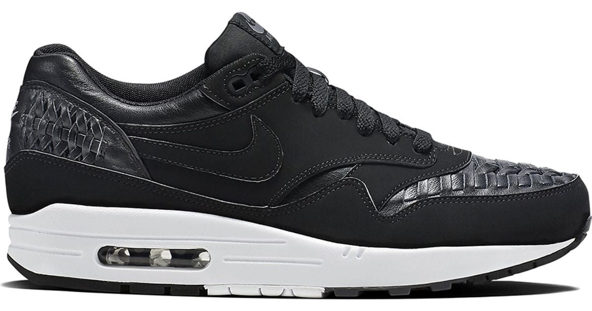 Nike Air Max 1 Woven Leather Low-Top Sneakers in Black for Men | Lyst