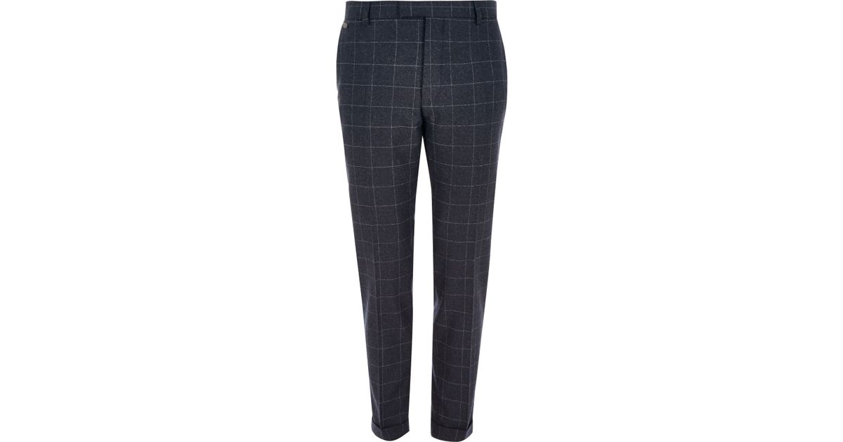 navy check skinny trousers