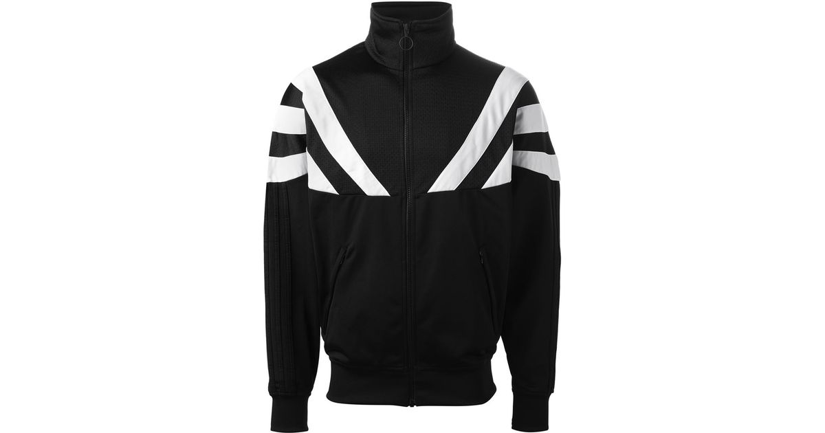 white and black striped adidas jacket
