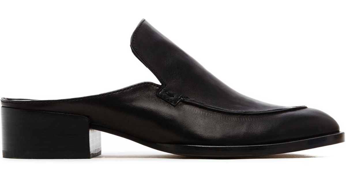 black loafer slides