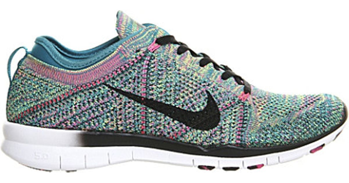 pink and green nike trainers
