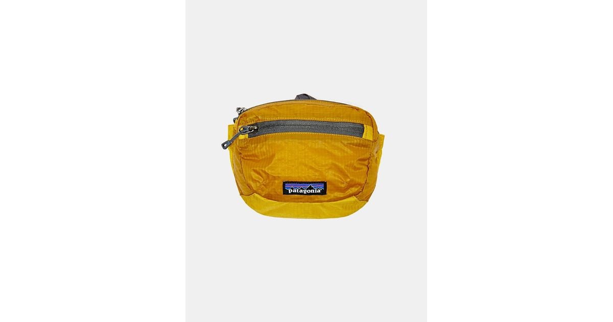 Patagonia Lightweight Mini Hip Pack in Yellow | Lyst