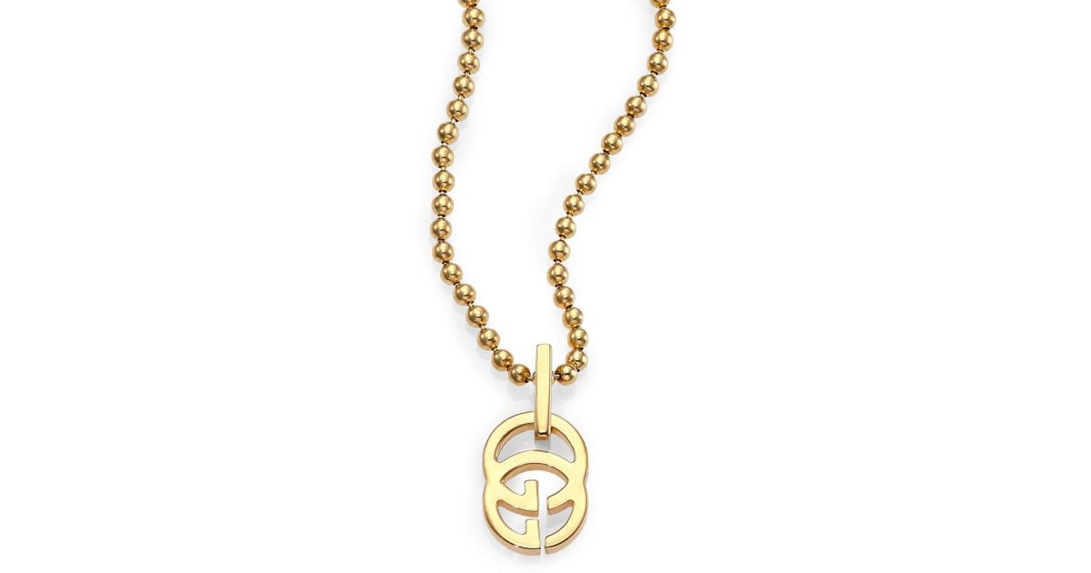 gucci gold pendant