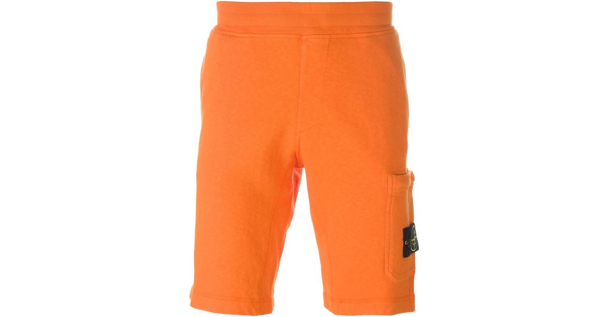 orange stone island shorts