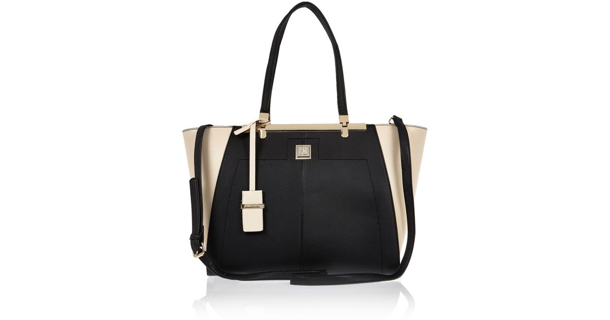 lyst river island black winged tote handbag in black lyst river island black winged tote handbag in black