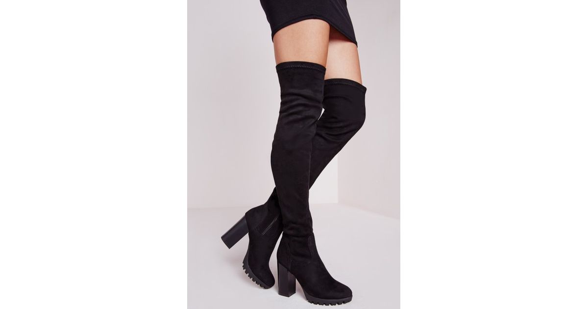 cleated sole over the knee boots
