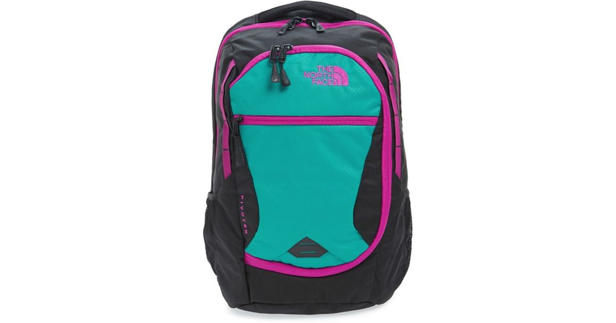 pink and green north face backpack
