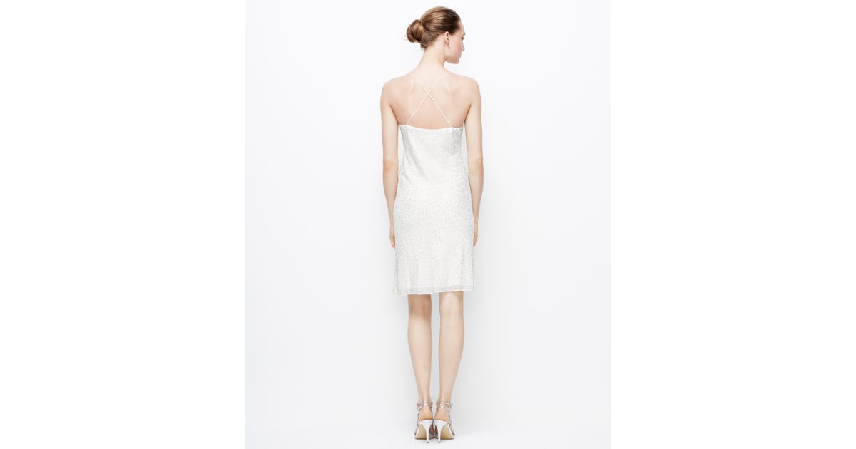 white sequin slip dress