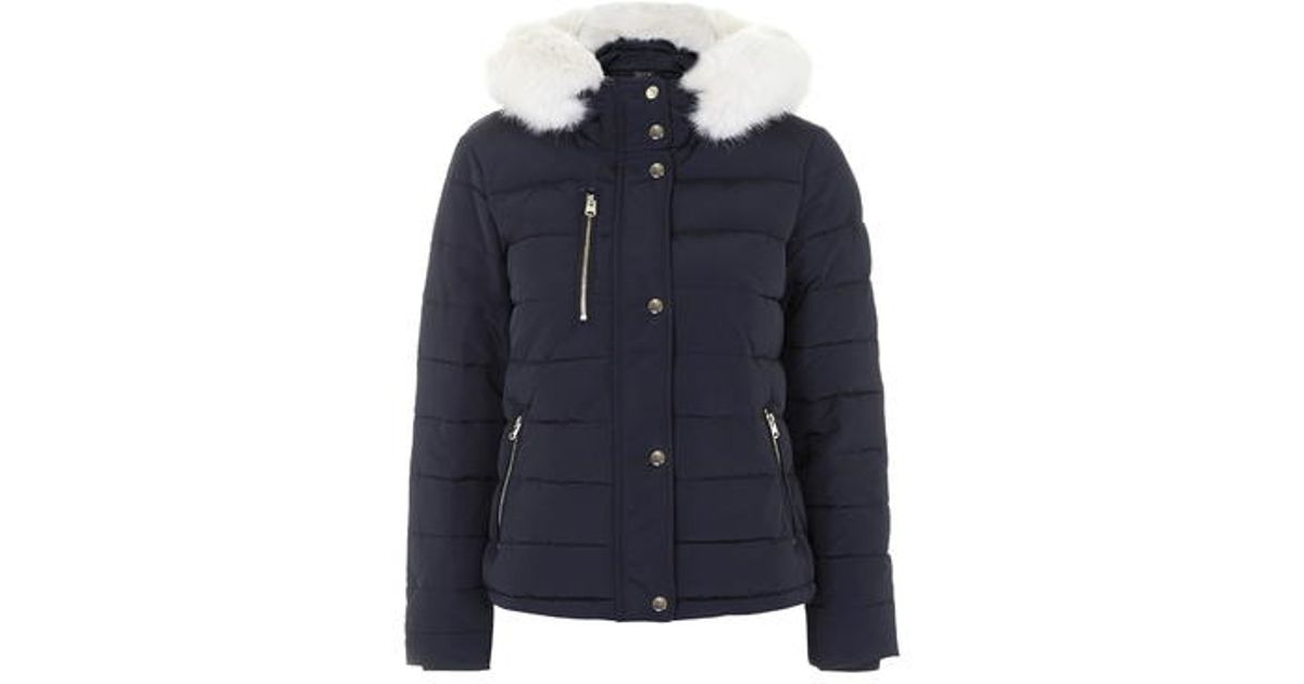 blue jacket with white fur hood