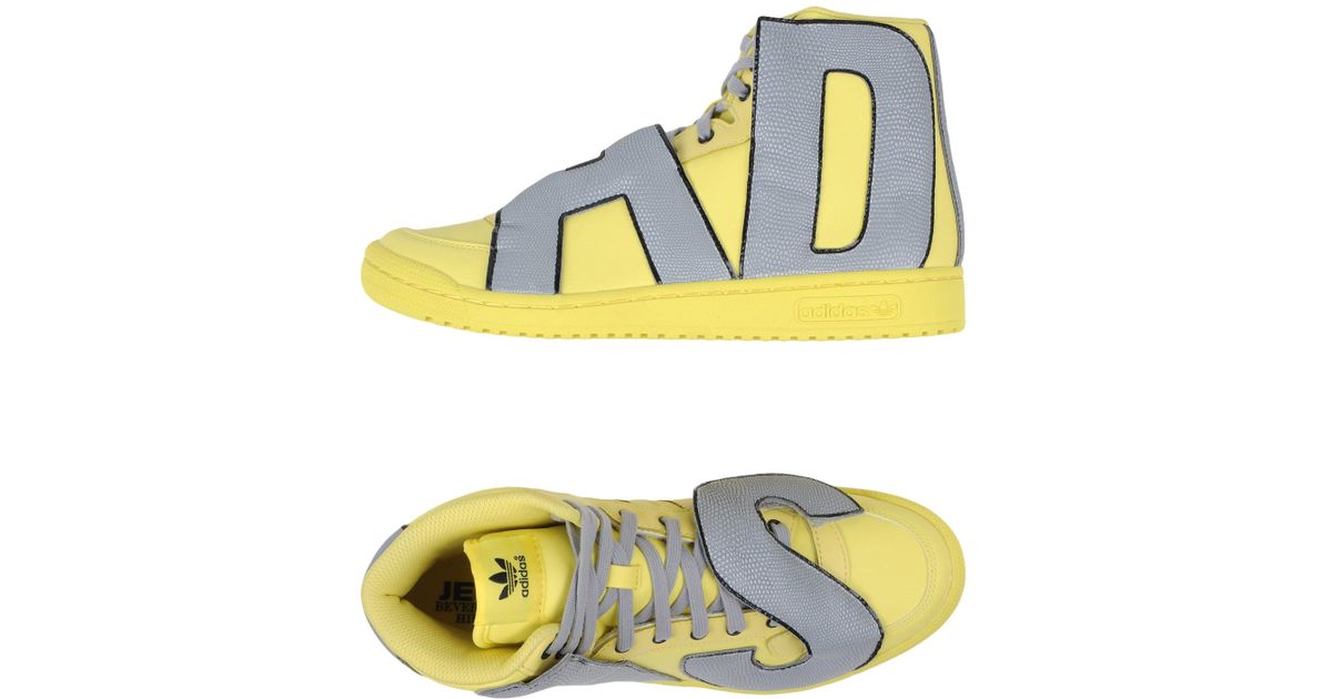 yellow adidas high tops