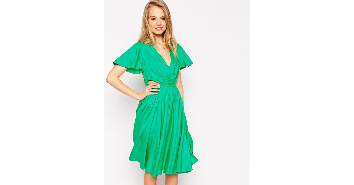 green flutter sleeve midi dress