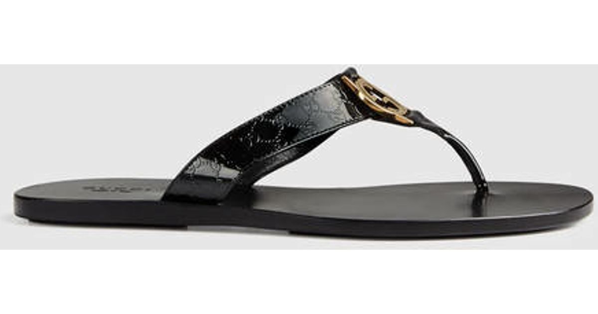 black patent leather flip flops
