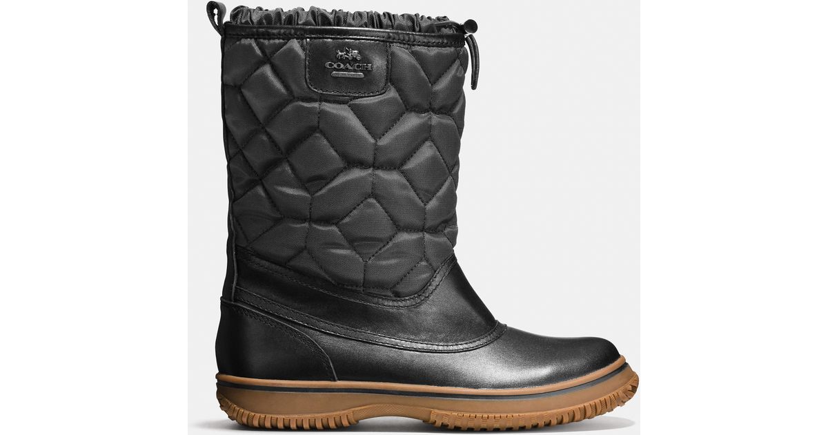 coach winter boots black
