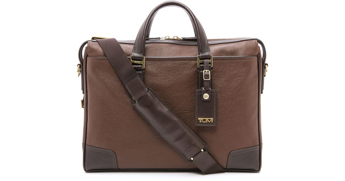 tumi leather suitcase
