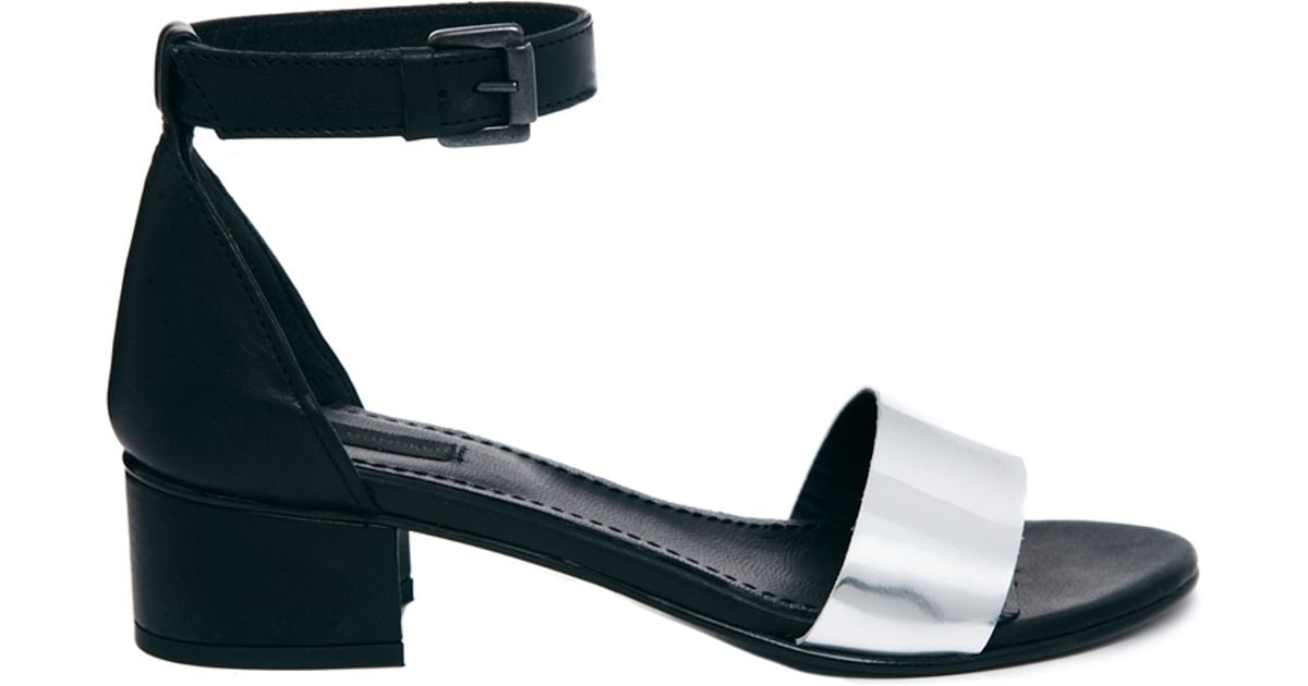 black and silver block heels