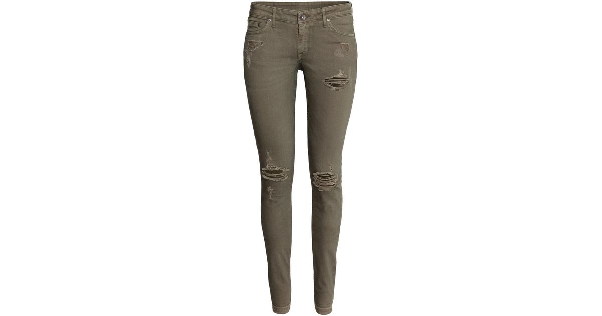 khaki green ripped jeans