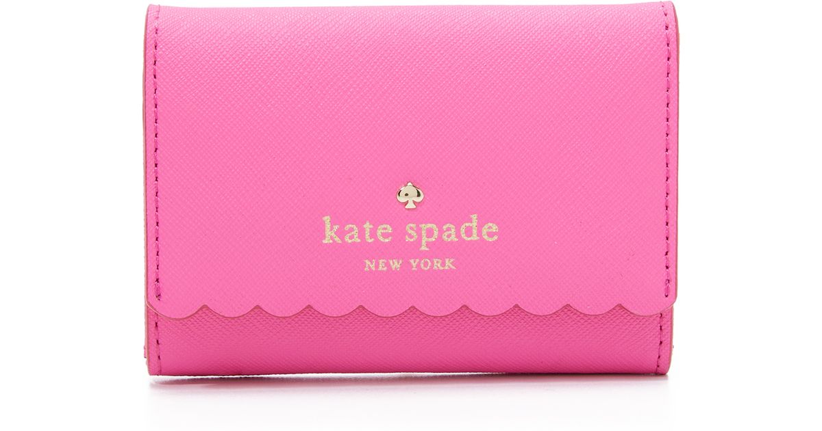 pink kate spade purse and wallet