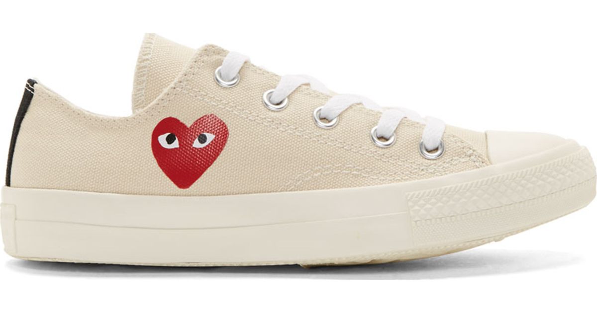 cream converse with heart
