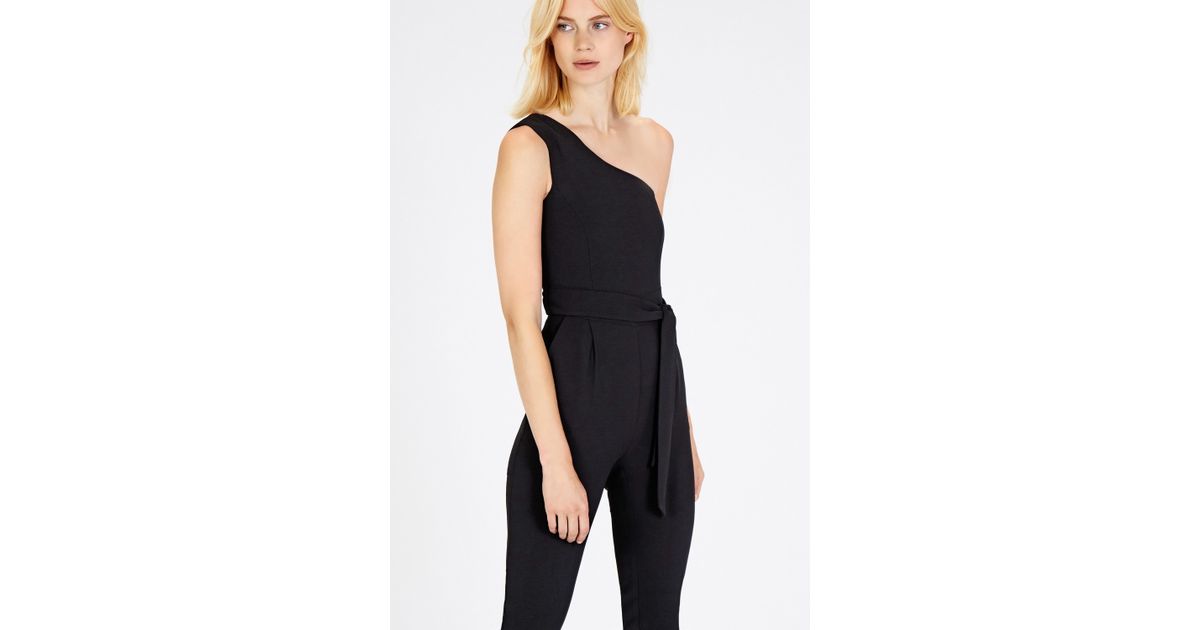 black belted one shoulder jumpsuit