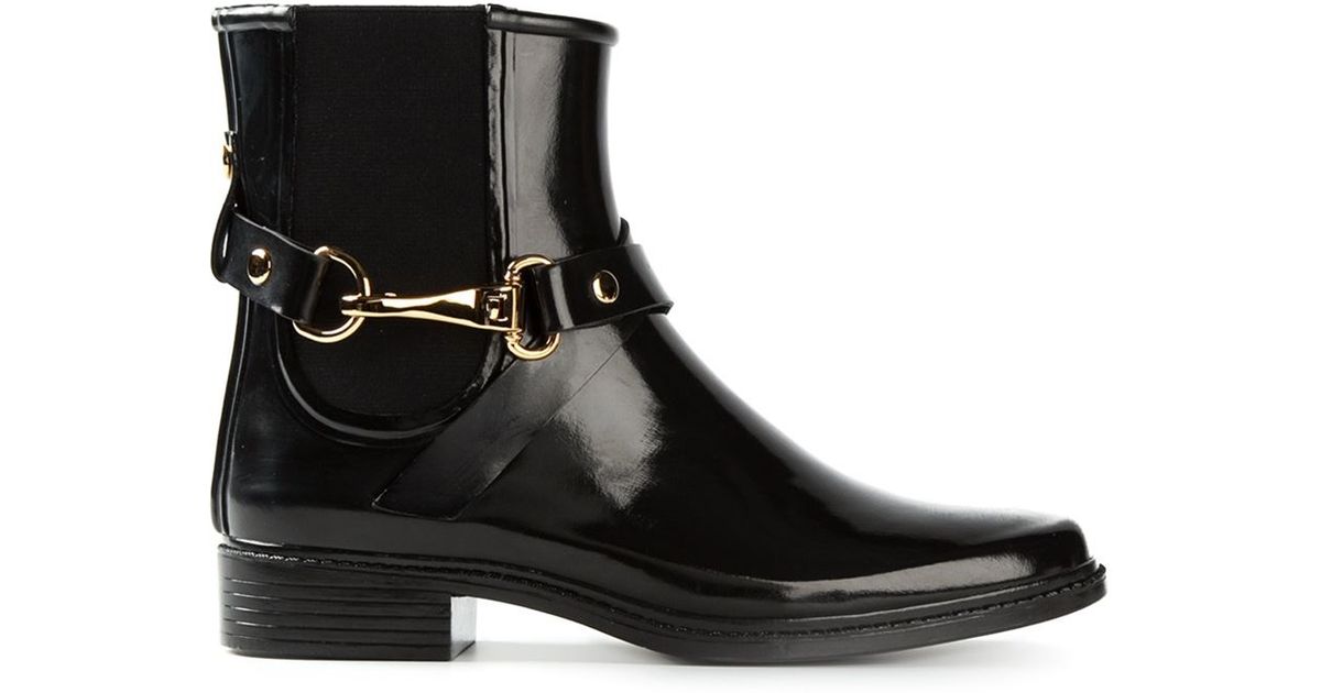 rain boots with buckles