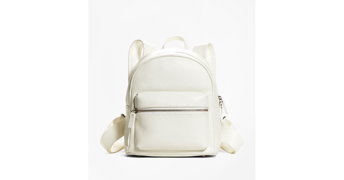small white leather backpack