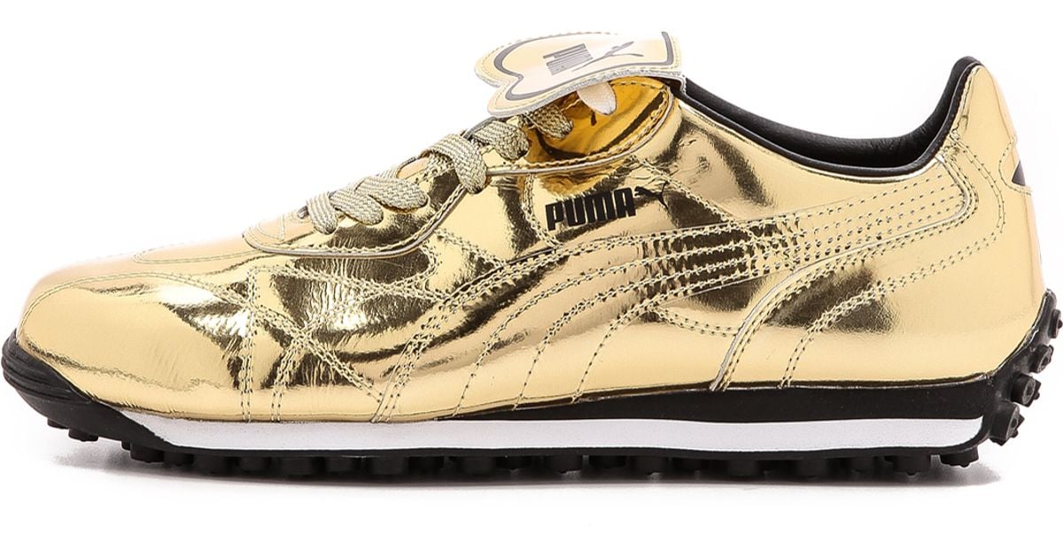 Puma Select Avanti 24k Gold Runners Low-top sneakers in Metallic Gold ...