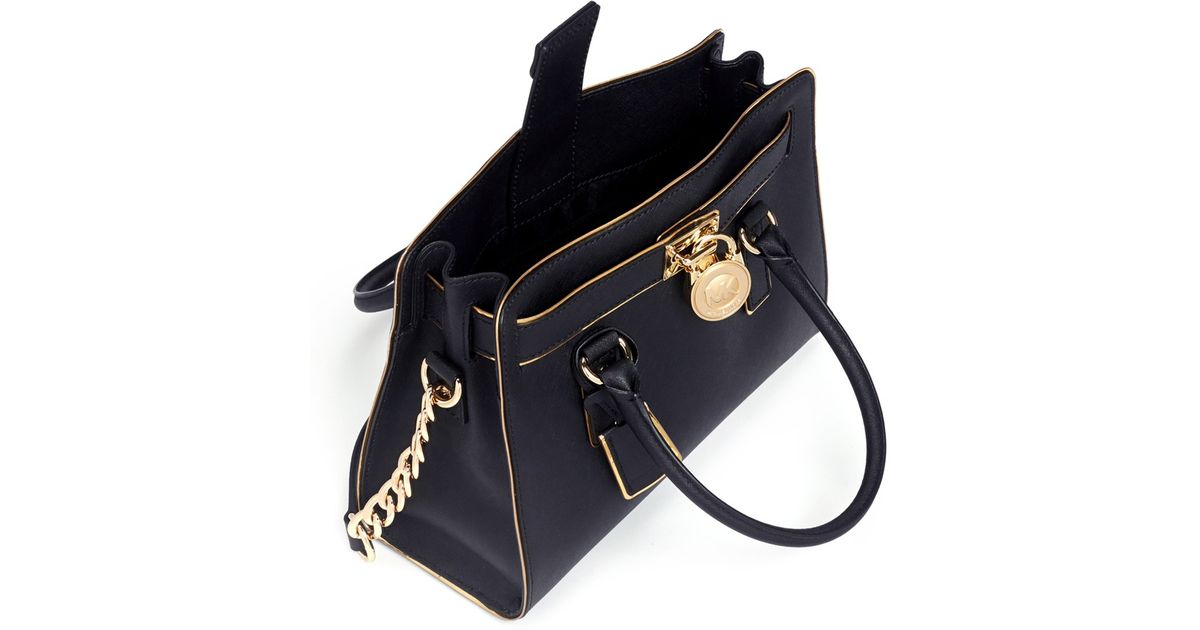 michael kors black and gold handbag