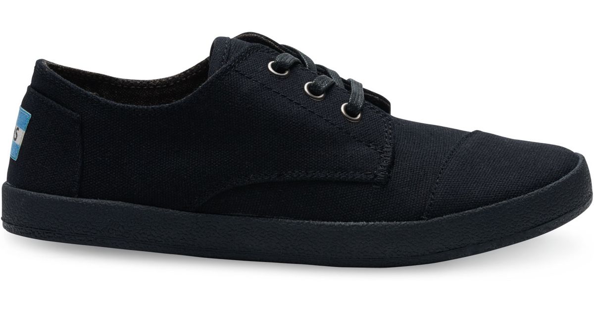 toms black on black canvas