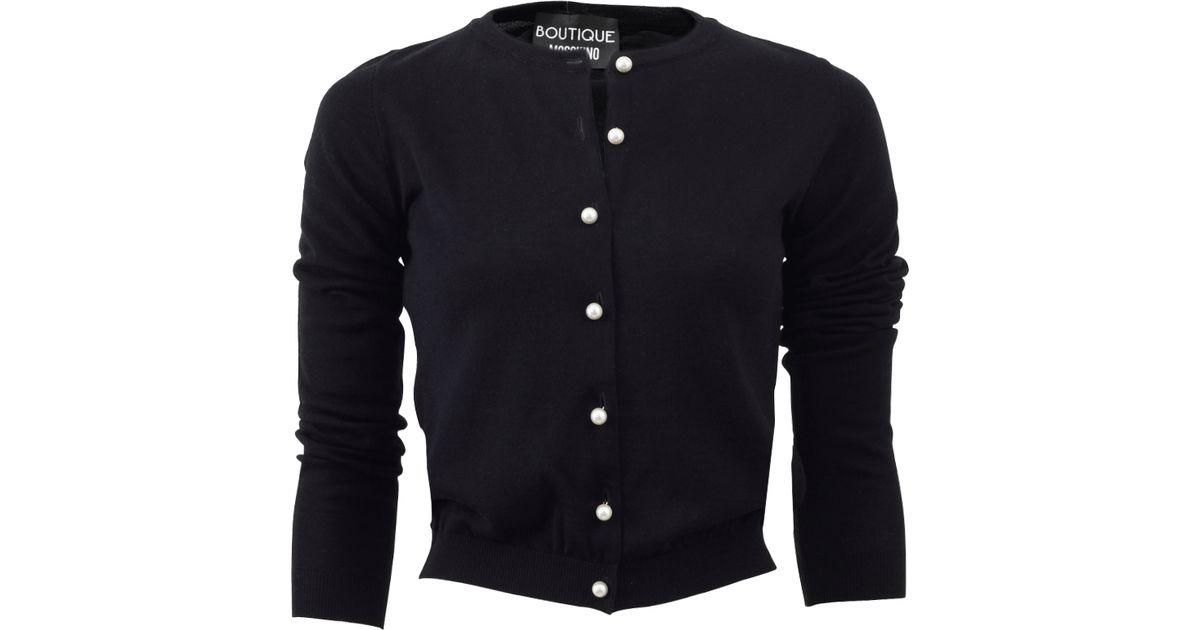 black cardigan with pearl buttons