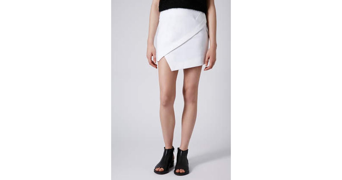 white asymmetrical mini skirt