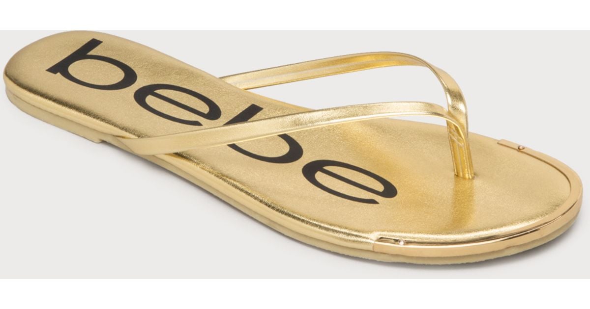 bebe gold flip flops