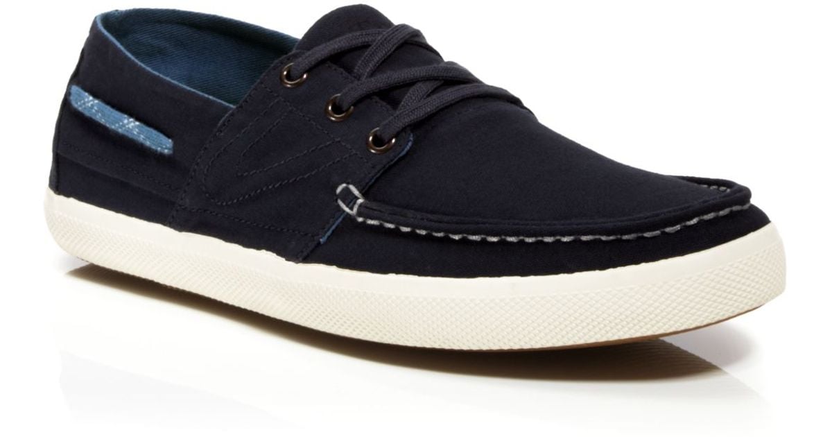 tretorn navy sneakers